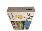 a box with a picture of a golf player on it