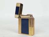 a lighter that is sitting on a white surface