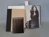 a book with a picture of a woman on it and a book with a picture of a woman on it