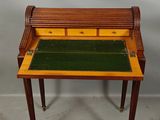 an image of a small desk with a green and yellow top