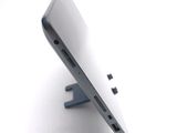 a close up of a cell phone on a stand