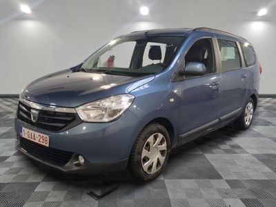 a picture of a small blue van parked in a garage