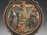 l'image d'une plaque en bois sur laquelle figure un crucifix