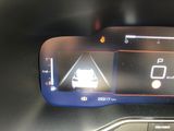 a digital display on the dashboard of a car