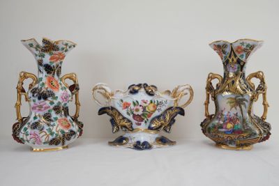 three vases are sitting on a white surface with a white background
