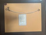 a picture of a framed picture of a bird on a wire