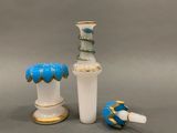 two vases that are sitting next to each other on a table