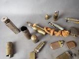many different types of lighters and lighters on the table