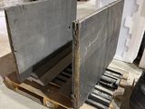 an image of a piece of metal on a pallet in a warehouse