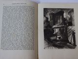 an open book with a black and white drawing on it