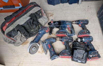 a lot of tools that are sitting on a table