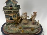 a figurine of a house on a table