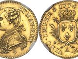 a gold coin with a crown on top of it