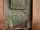 a close up of an old suitcase with a name on it