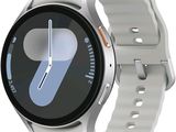 a smart watch with a white band on a white background