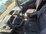 a car that has a steering wheel and a seat in it