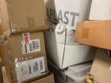 a pile of boxes that are stacked on top of each other