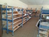 a room with shelves and shelves filled with various items