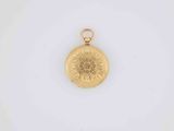 a gold locke with a flower design on it