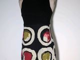 a dress on a mannequin on a white background