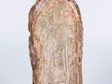 a small glass bottle with a gold decoration on it
