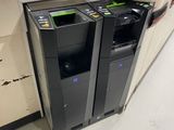 a photo of a computer and printer in a store