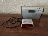 a radio that is sitting on a table next to a charger