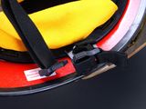 a close up of a fireman ' s helmet with a safety belt