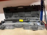 a hard case with a yellow sticker on it