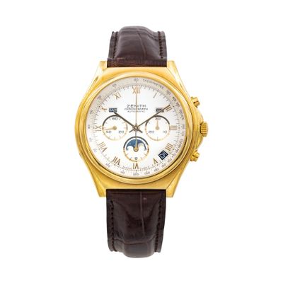 a close up of a gold wrist watch with a white dial