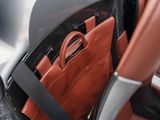 a brown bag sitting in the back seat of a car