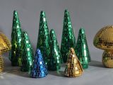 many different types of christmas trees in a row