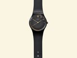 the watch is black and has a black strap