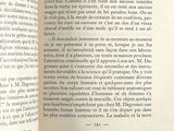 an open book with a picture of a cat on it