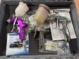 a plastic container with a spray gun and other items in it