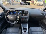 the interior of a car with a steering wheel, dashboard, and dash board
