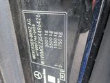 a close up of a car door with a sticker on it