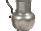 a silver vase with a handle on a white background