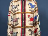 an image of a shirt with horses on it on a mannequin stand