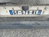 a license plate on the back of a truck