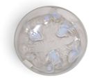 an overhead view of a glass of water with ice cubes