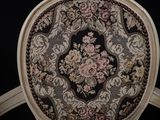 a chair that has a floral pattern on it