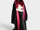 costume of a man in a red and black robe and hat