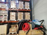 a lot of boxes and hoses in a warehouse