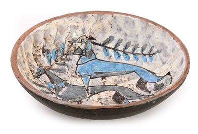 a bowl with a painting of a man on it