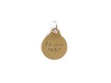 a close up of a gold medal with the date on it