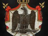 an old coat of arms with a crown and two birds on it