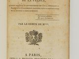 un livre ouvert sur lequel est posée l'image d'un oiseau