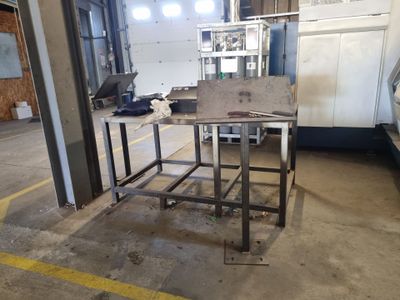 an image of a metal work bench in a factory