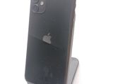 a black iphone sitting on top of a stand